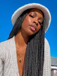 girl wearing synthetic braids extensions